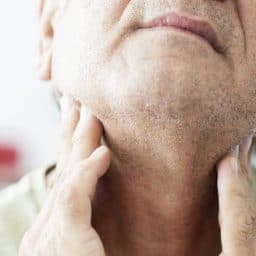 Man feels throat