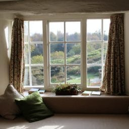 A window and curtains indoors.