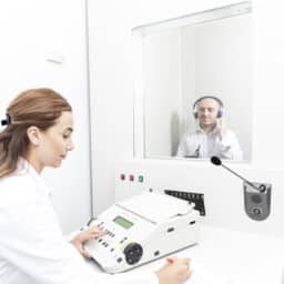 Doctor administering a hearing test