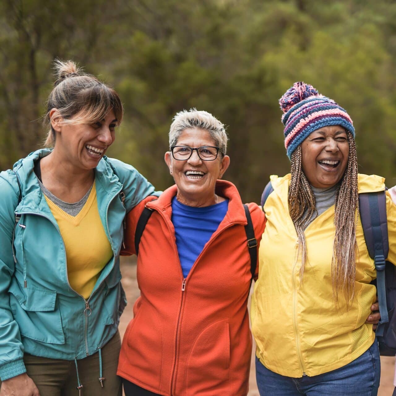 Group of hikers enjoying Oregon's evergreen forests in winter.